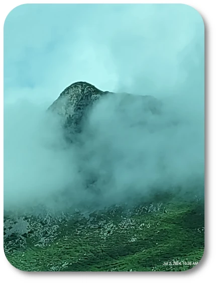 The Pyrenees mountains rising along the road to Lourdes